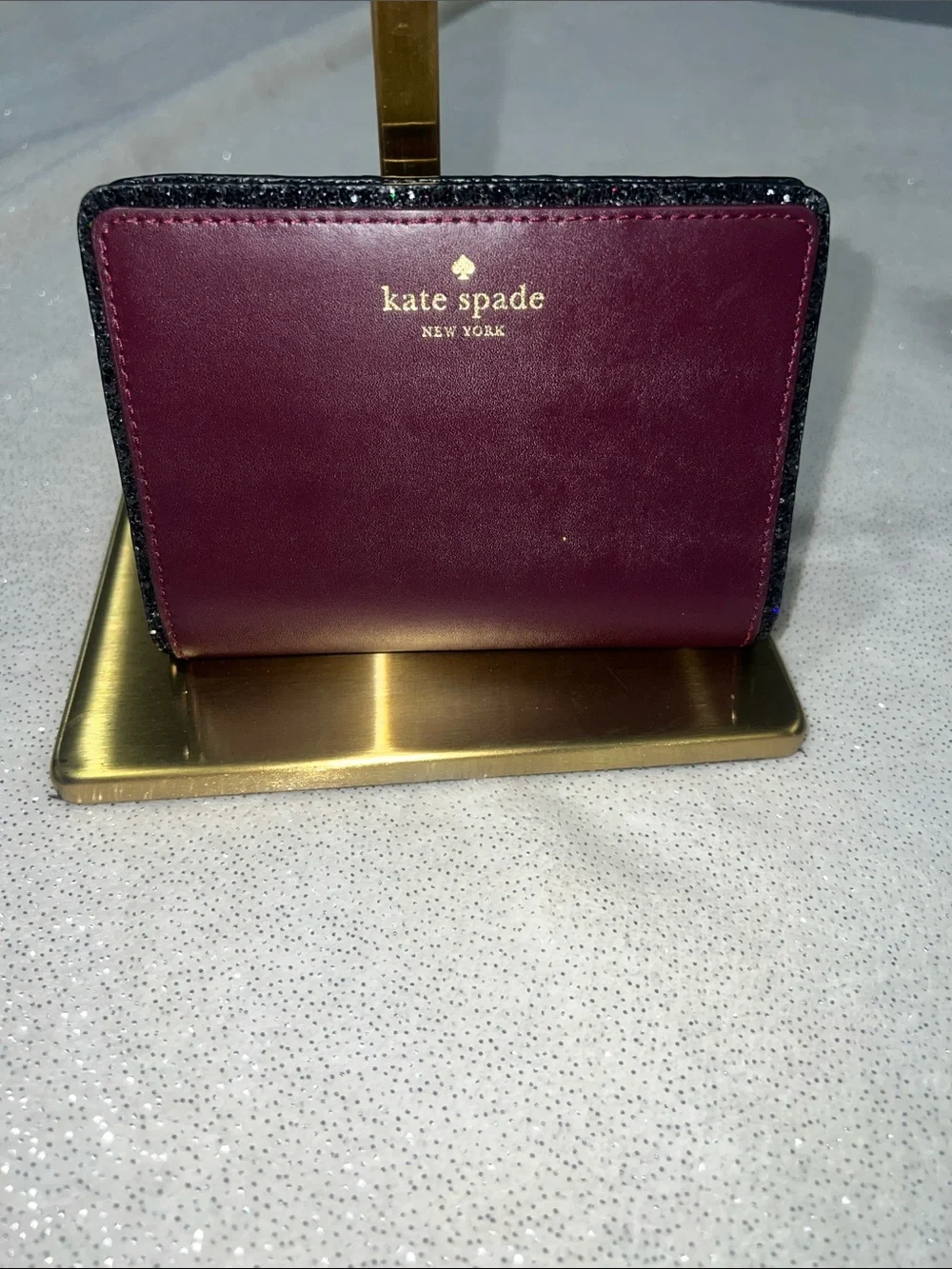 kate spade wallet in deep plum . EUC
